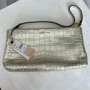 Brand new Never used.  Rebecca Minkoff - Zip Clutch